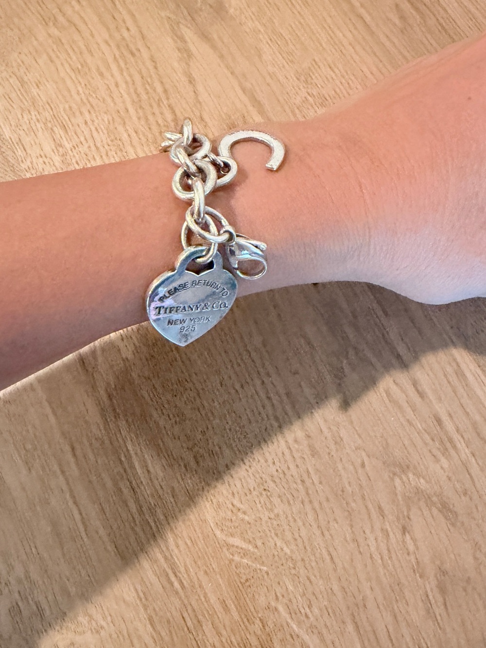 Tiffany & Co. return to tiffany plus horseshoe charm